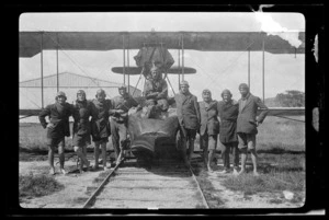 Instructor and students grouped in front of a Walsh flying boat