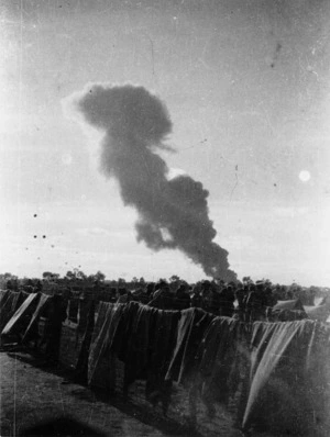 Air force raid on Benghazi Harbour, Libya, seen from prison camp 116