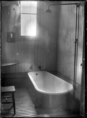 Interior of a private bath at Helensville hot springs, ca 1912.