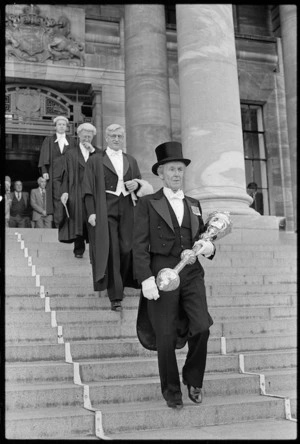 Dr Gerald Wall, the new speaker, being led down the steps of Parliament - Photograph taken by Ross Giblin