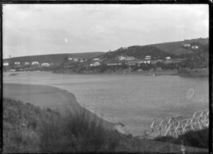 View of Taieri Mouth, with bridge over the river in right foreground