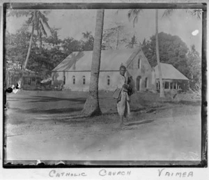 Young man outside the Catholic Church at Vaimea, Samoa