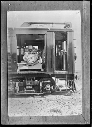 Westinghouse petrol-electric rail motor. View of a portion of this railcar, showing driver's cab, and side view of the engine, 1914.