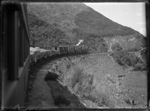 View from the rear of a Fell train with three engines, on a bend descending the Rimutaka Incline