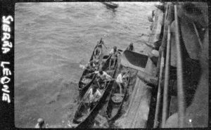 Canoes from Sierra Leone coming alongside the World War 1 troopship Ruapehu