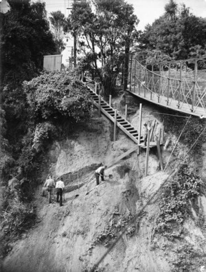 Workmen building steps to give access to the tunnel to be built at the bottom of the Hobson Street gully, Wellington