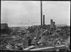 Part 1 of a 2 part panorama showing the aftermath of a fire at Cook's Cooperage, Petone, 14 January 1914.