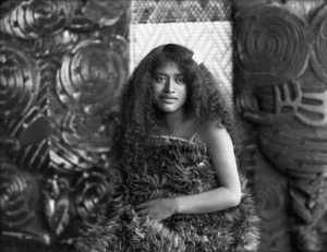 Pringle, Thomas, 1858-1931 :[Young Maori woman at Te Rauru meeting house, Whakarewarewa]