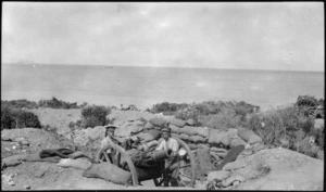 Two soldiers of the Lowland Scottish Artillery with a field gun, Gallipoli, Turkey