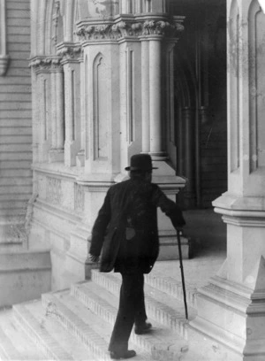 William Rolleston entering parliament buildings, Wellington