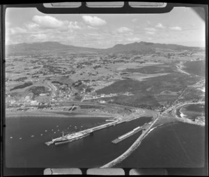 New Plymouth, view of Port Taranaki, includes ship, wharf, housing, farmland and shoreline