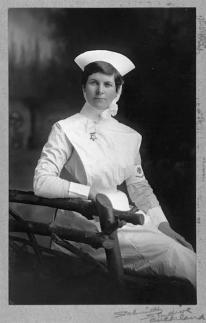 Unidentified nurse in uniform - Photograph taken by Schmidt Studios