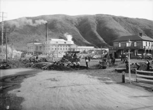 Men working on the railway outside the Grand National Hotel, Petone