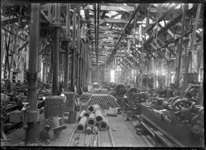 Petone Railway Workshops. Lathes in the machine shop, with piles of newly turned axles.