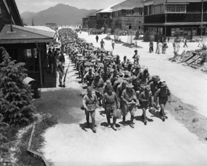 Japanese servicemen marching through the Otaki repatriation centre, Japan