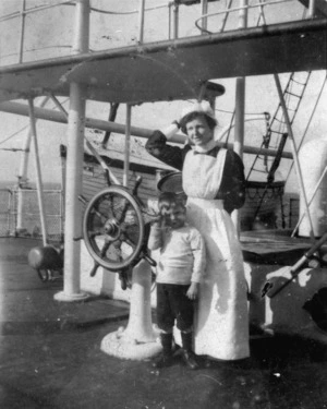 Unidentified ships' stewardess and child