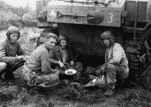 New Zealand. Military training - Tank crew eating a meal