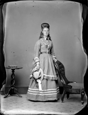 Standing portrait of an unidentified woman