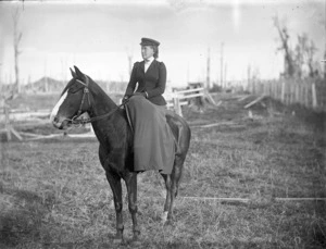 Unidentified woman on horseback