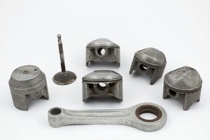 Munro, Herbert James, 1899-1978 :[Hand-made pistons, a valve and a connecting rod for a motor bike engine. 1950s-1960s]