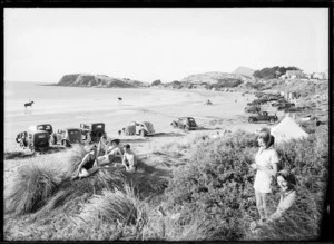People and cars at Titahi Bay, Porirua