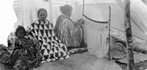 Unidentified Maori group, and woman making a cloak