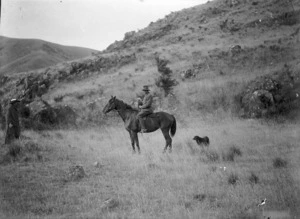 Cyril McCusker on horseback, in the uniform of a mounted rifleman, Taylor Pass, Marlborough