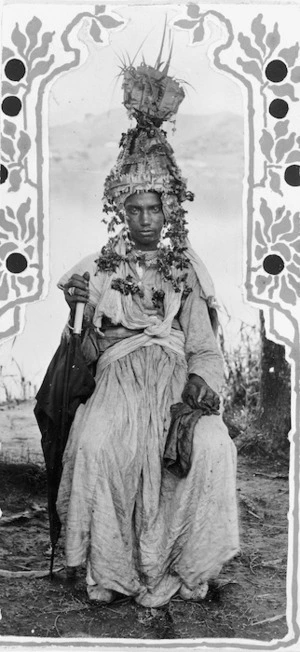Portrait of a Fijian Indian villager with a gown and head-dress