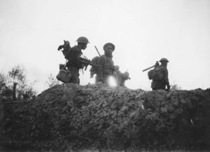 Kaye, George, b 1914 (Photographer) : World War 2 New Zealand soldiers advancing on to enemy held positions in the Senio River area, Italy
