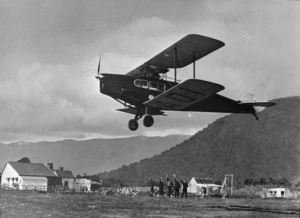 A biplane at the aerodrome at Haast