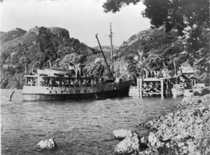 Ferry Coromel, and passengers, at Port Fitzroy wharf, Great Barrier Island
