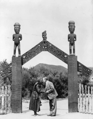 Moore & Thompson (Photographers) : Rangitiaria Dennan and the managing director of Shaw Savill, greet each other with a hongi, at the gateway to a Maori marae or pa