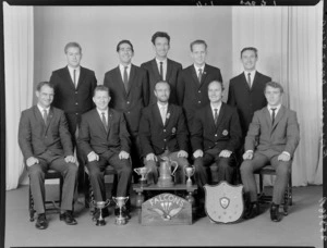 Falcons Dart Club, with cups and shield