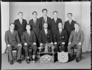 Falcons Dart Club, with cups and shield