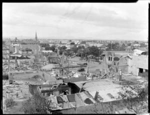 1931 Hawke's Bay earthquake, unidentified street location, Napier, view from hill side of destroyed buildings