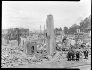 1931 Hawke's Bay earthquake, unidentified location, men standing in front of damaged building