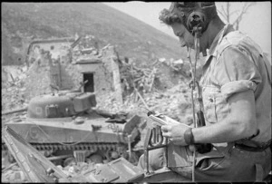 New Zealand soldier communicating with a tank in another area, Cassino, Italy, during World War 2