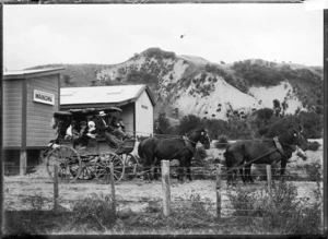 Horse drawn wagon alongside the Waikohu railway station