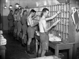 Sorting letters for troops at the NZ Army Post Office in Cairo, Egypt