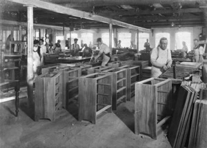 Interior of the cabinetmaking workshop of Wellington Woodware Co Ltd, showing workers