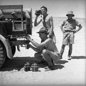 Soldiers of the 6th New Zealand Infantry Brigade, drinking water during manoeuvres at El Saff, Egypt