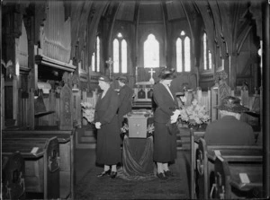 Nurses keeping guard beside the coffin of Sir Truby King, St Paul's Pro-cathedral, Wellington