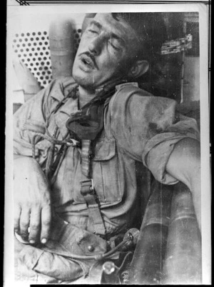 New Zealand World War 2 soldier Merv L Stringer asleep after four days and nights days in action, Italy