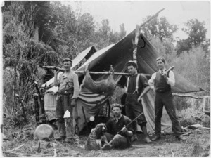 Members of A H Bogle's survey party at their camp