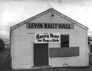 Levin Rally Hall and sign advertising happy hour