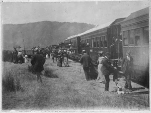 Passengers disembarking from race train