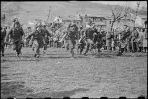 New Zealand World War 2 soldiers entertaining Italian children, Muccia, Italy