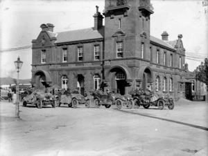 Newman Brothers service cars alongside the Nelson post office