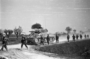 New Zealand infantrymen and tanks continuing the advance in the Senio area, Italy - Photograph taken by George Kaye