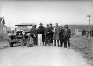 Group alongside a Newman's service car, Murchison